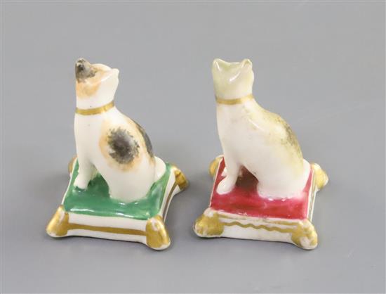 Two Rockingham porcelain toy figures of cats, c.1826-30, H. 3.8cm and 3.5cm